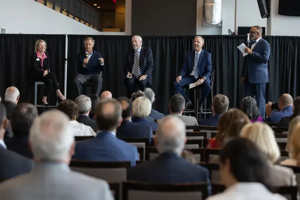 men standing in a conference