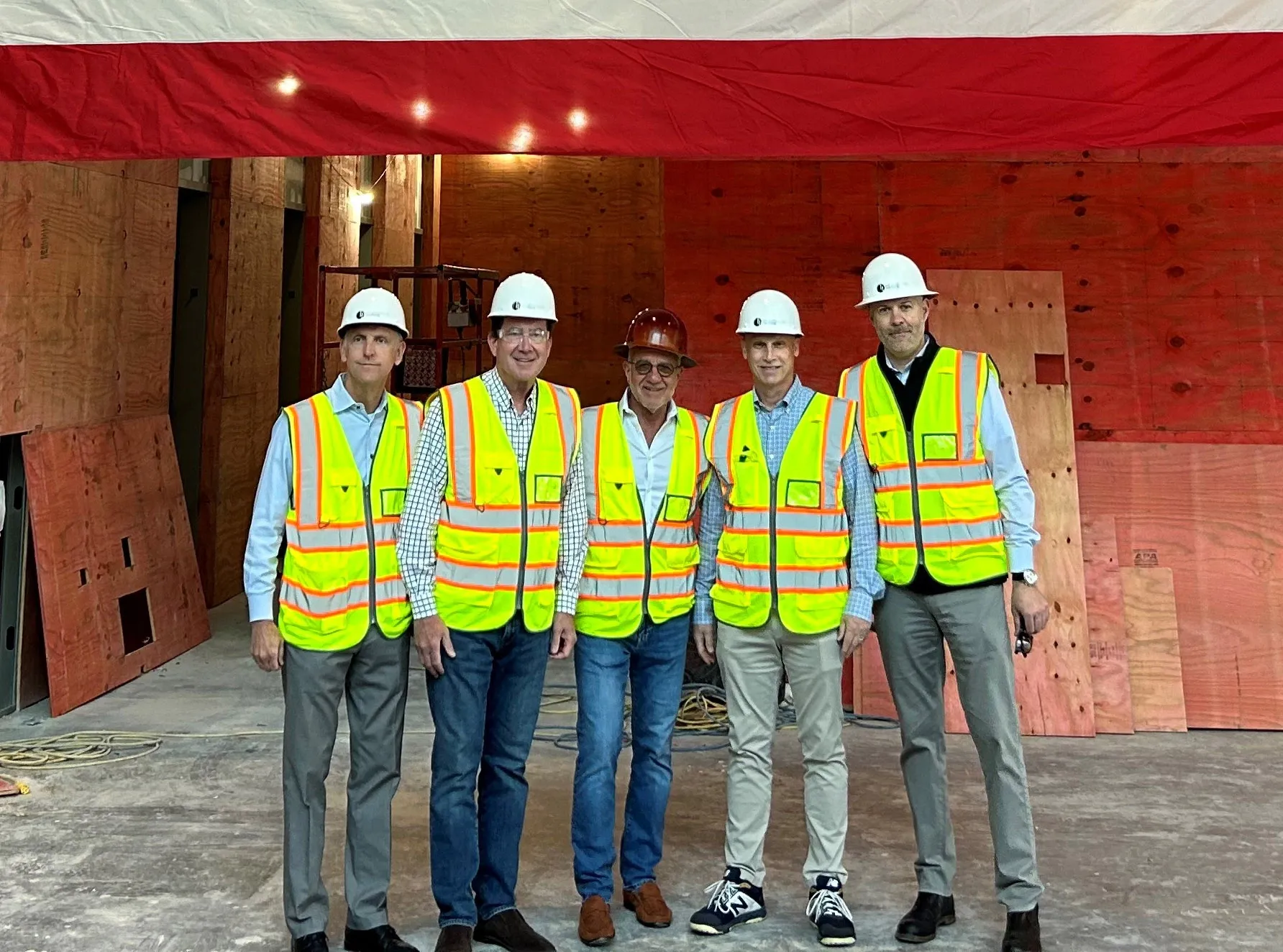 men standing at a construction site